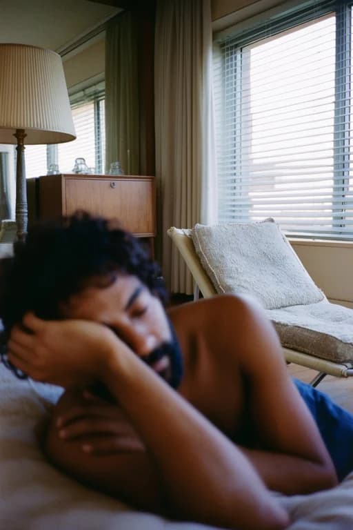 1970s-style film photo — man resting on a bed example from the How to Spot AI-Generated Faces and Portraits guide
