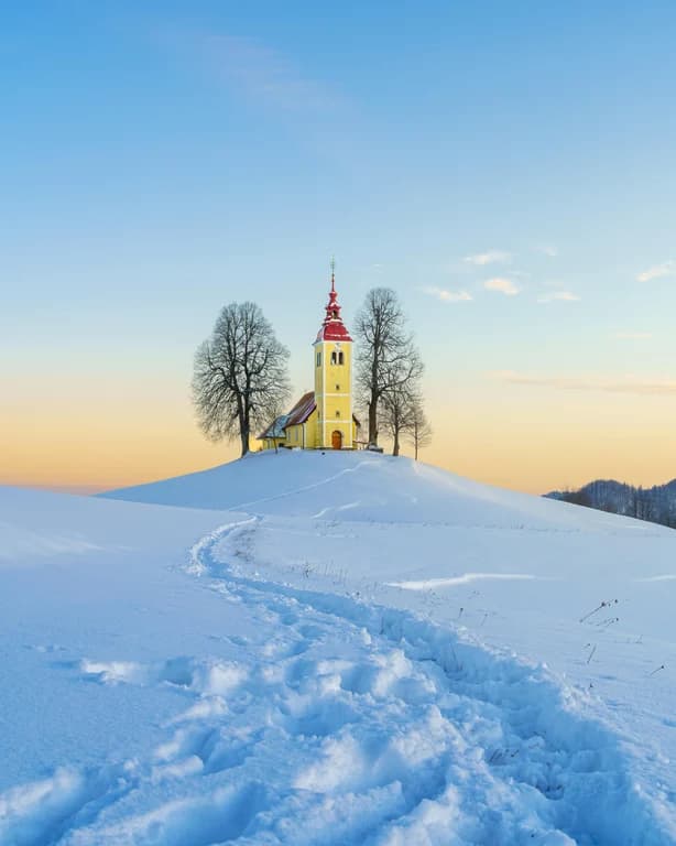 Church on snowy hill example from the Real Photos That Look AI-Generated guide