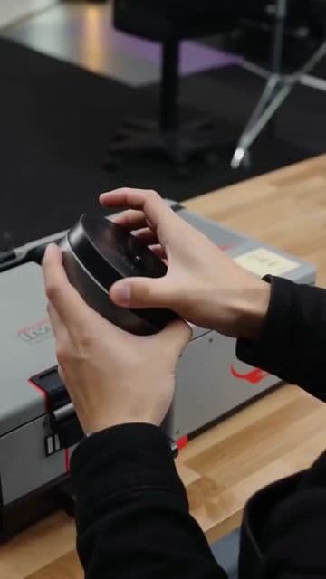 Someone holding an IMAX camera example from the How to Spot AI-Generated Faces and Portraits guide